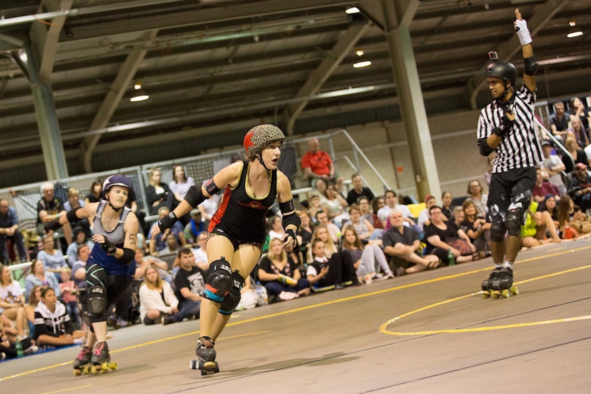 A roller derby game in action.