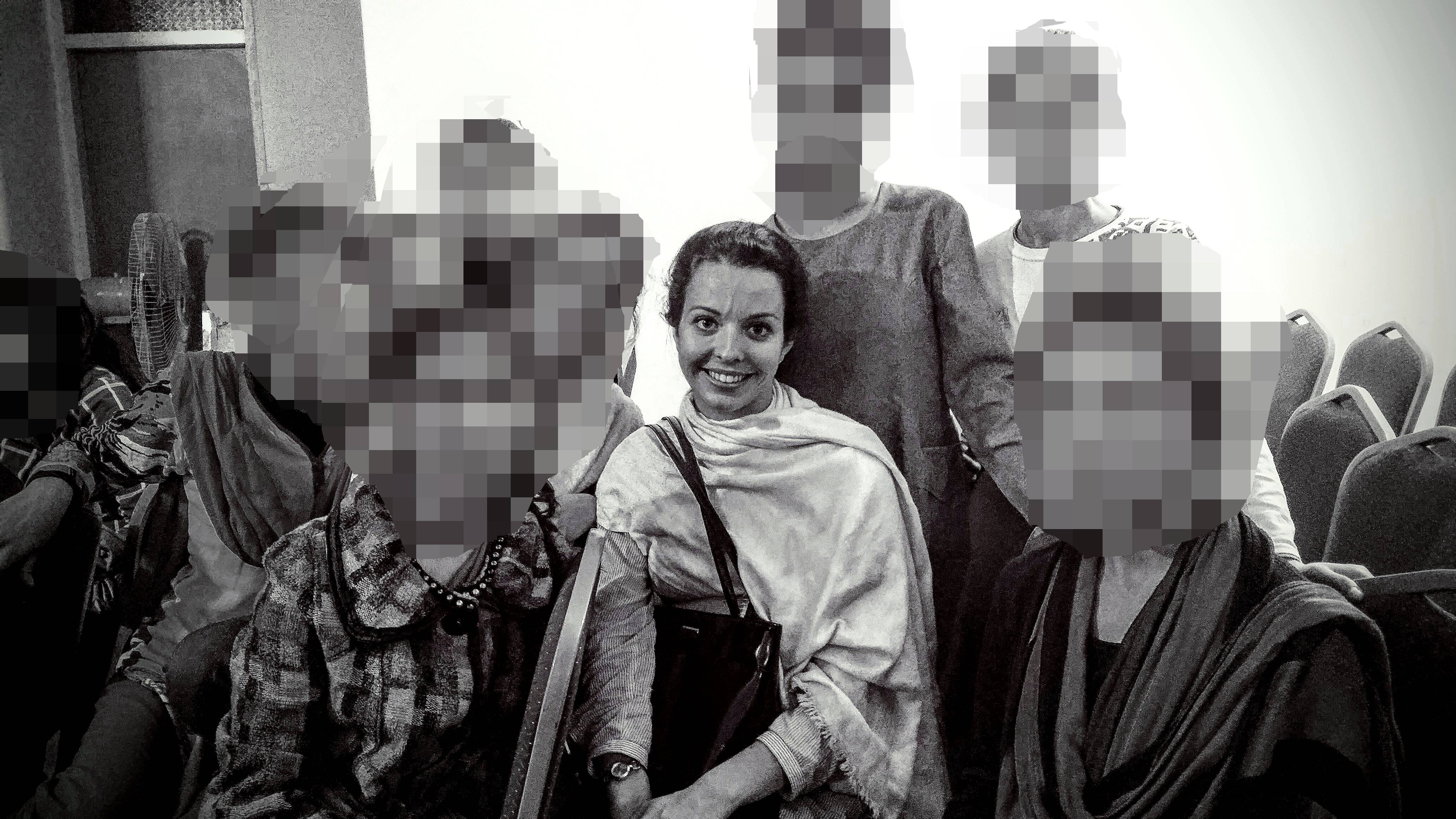 A young Adelaide music teacher with students in Afghanistan.