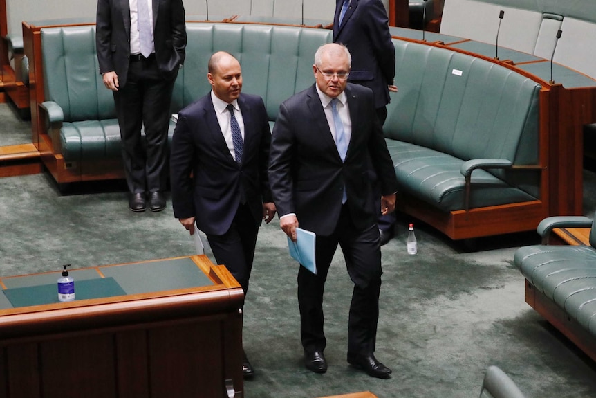 Josh Frydenberg and Scott Morrison walk through the house of representatives