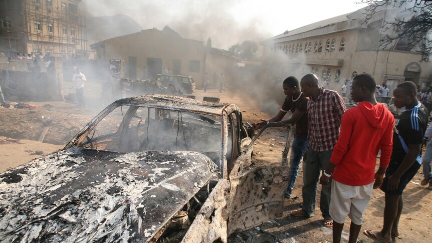 Car wrecked by bomb blast in Nigeria