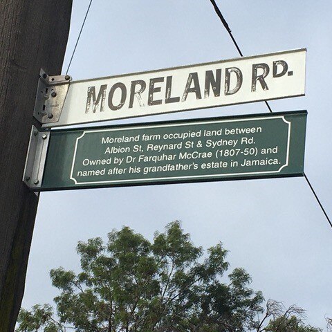 Street sign for Moreland Rd in Melbourne's Moreland LGA. Sign underneath says the Moreland farm was named after Jamaican estate.