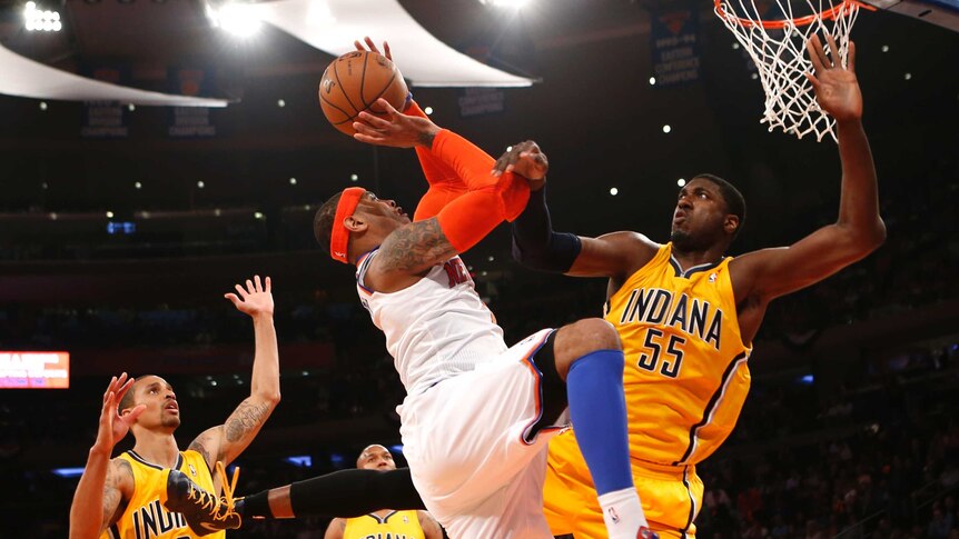 New York Knicks' Carmelo Anthony shoots against Indiana