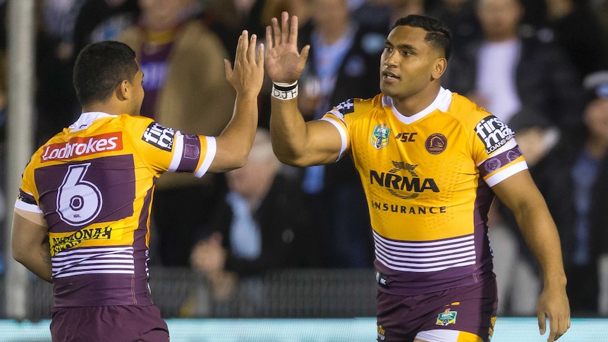 Tevita Pangai Junior celebrates his try for Brisbane against Cronulla