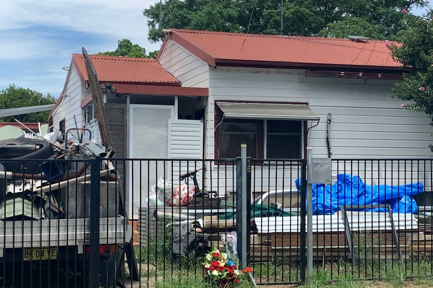 A home with wreaths and flowers