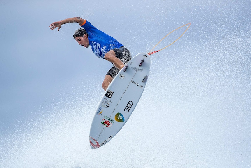 Gabriel Medina rotating through the air in Tahiti