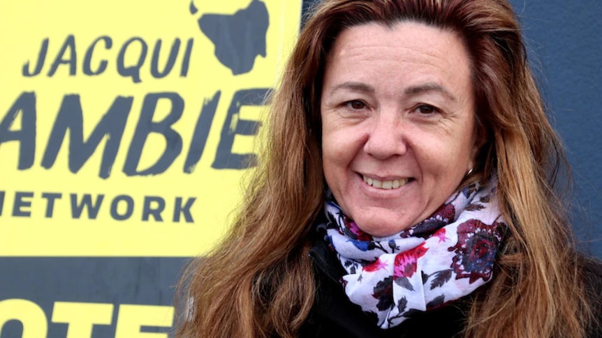 A middle-aged woman with brown hair