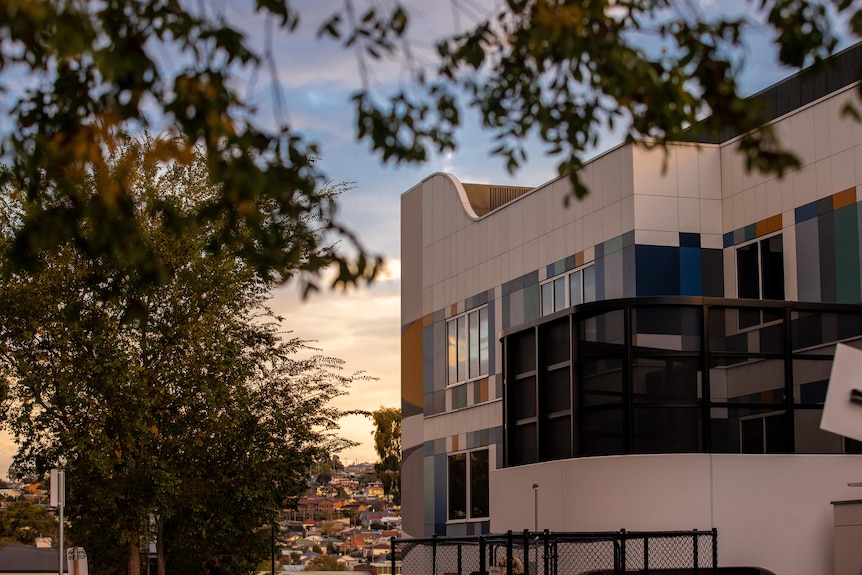 A building next to a tree at Launceston General Hospital.