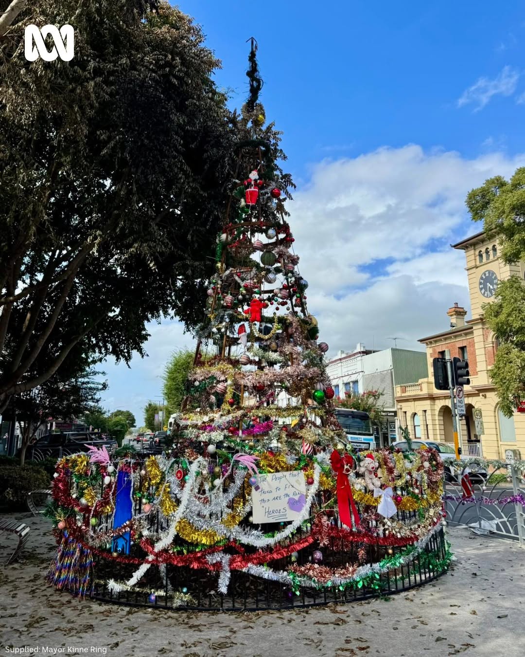 Woman charged over fire that destroyed regional NSW community Christmas tree