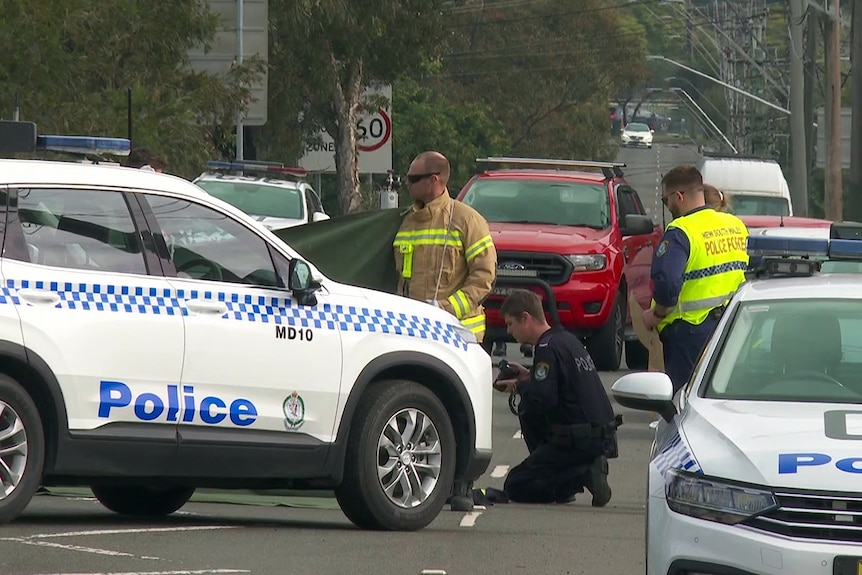 NSW Police and emergency services attend the scene of an alleged road rage incident at Blackett in Sydney's west