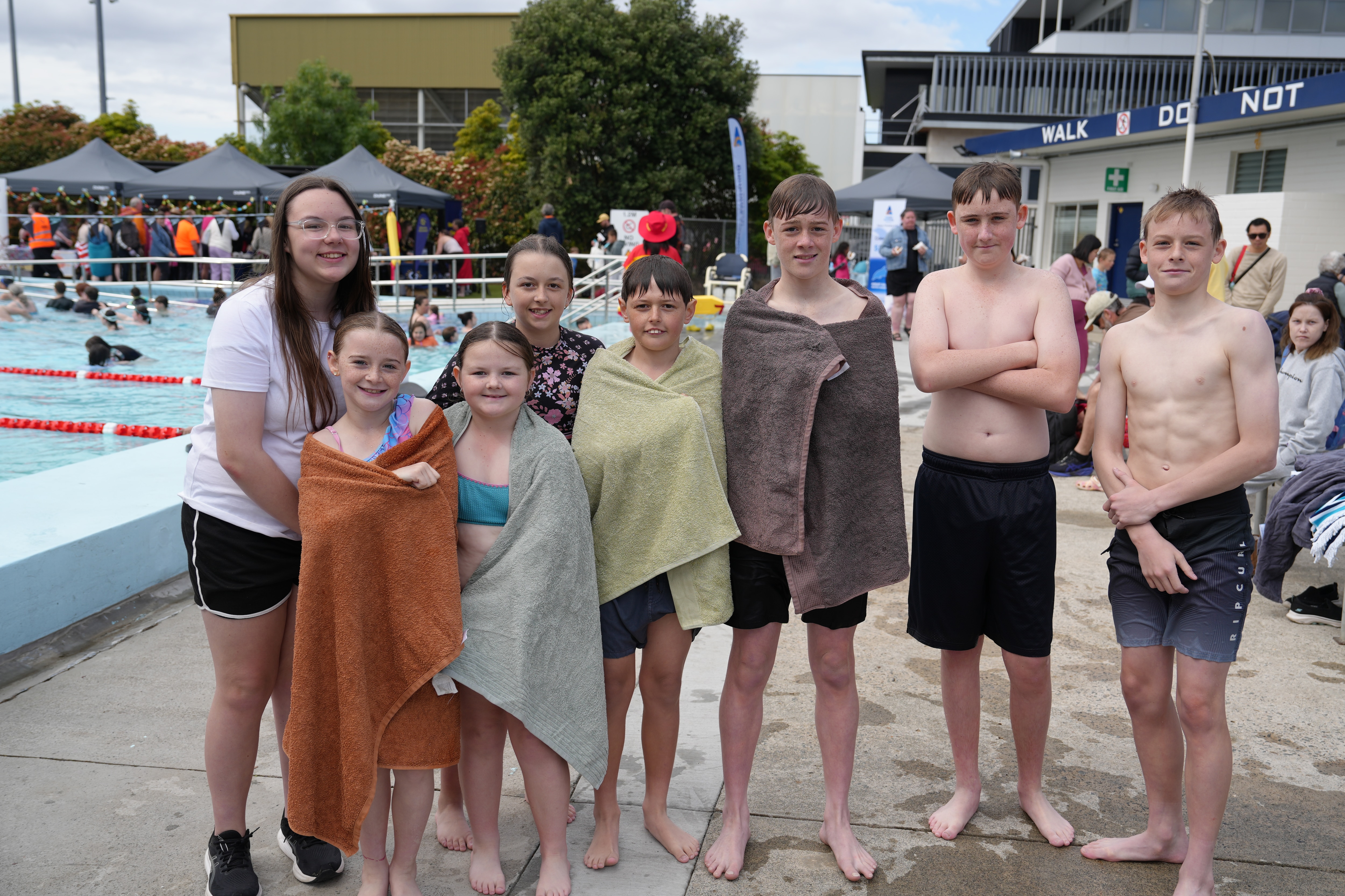 Olympic star takes on challengers at pool's grand reopening