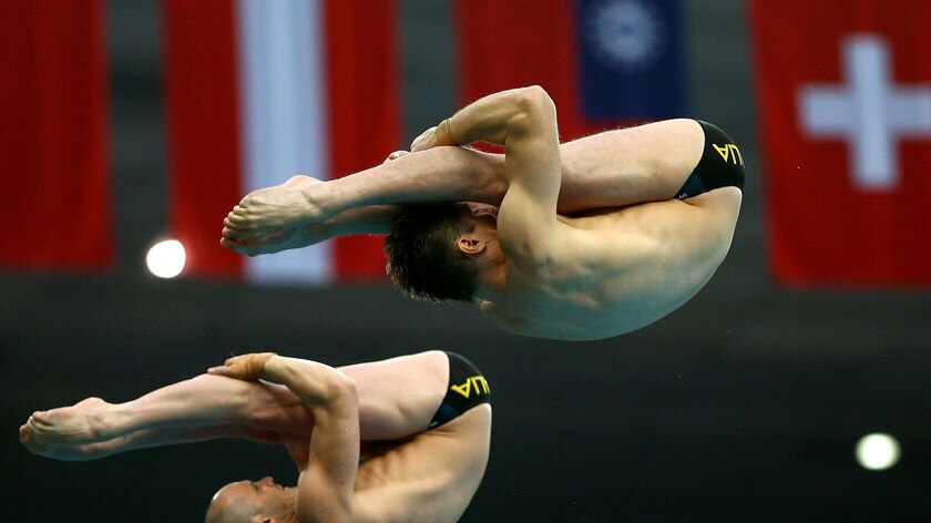 Mathew Helm and Robert Newbery dive during the men's synchronised 10m platform final