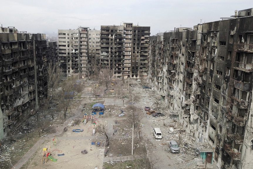 An aerial view shows towers of residential buildings that were damaged during Russia's invasion of Ukraine.
