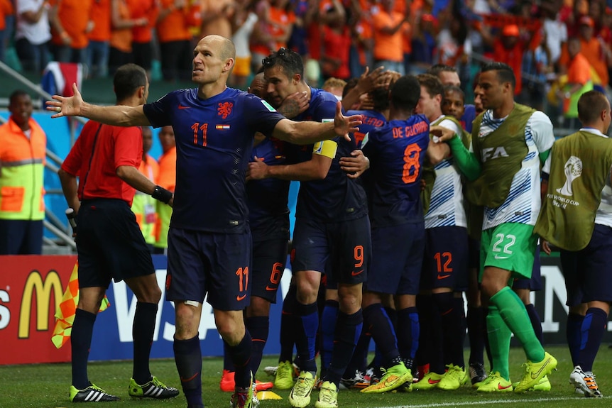 Arjen Robben celebrates a Dutch goal against Spain