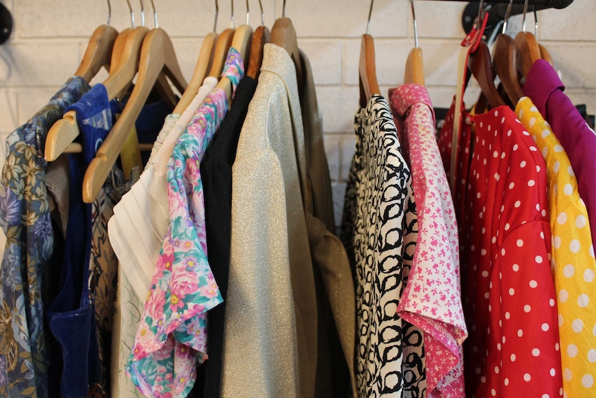 Vintage clothing on a rack.