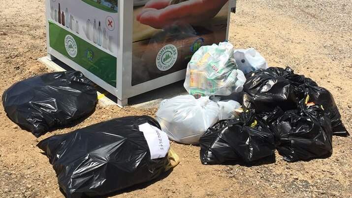 An overflowing container refund bin in Bowen in December 2018.