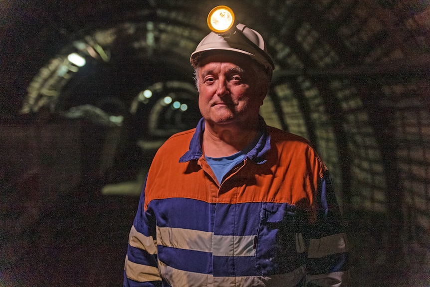 A man in a hard hat.