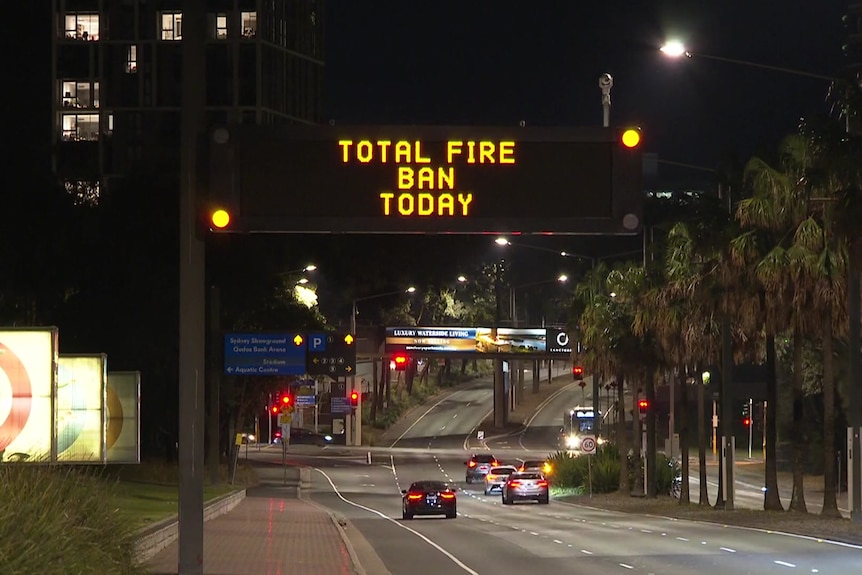 signage over road reads total fire ban today