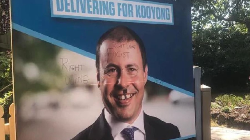 A campaign poster with the words right wing fascist written across Josh Frydenberg's face.