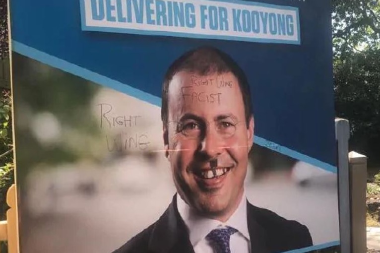 A campaign poster with the words right wing fascist written across Josh Frydenberg's face.