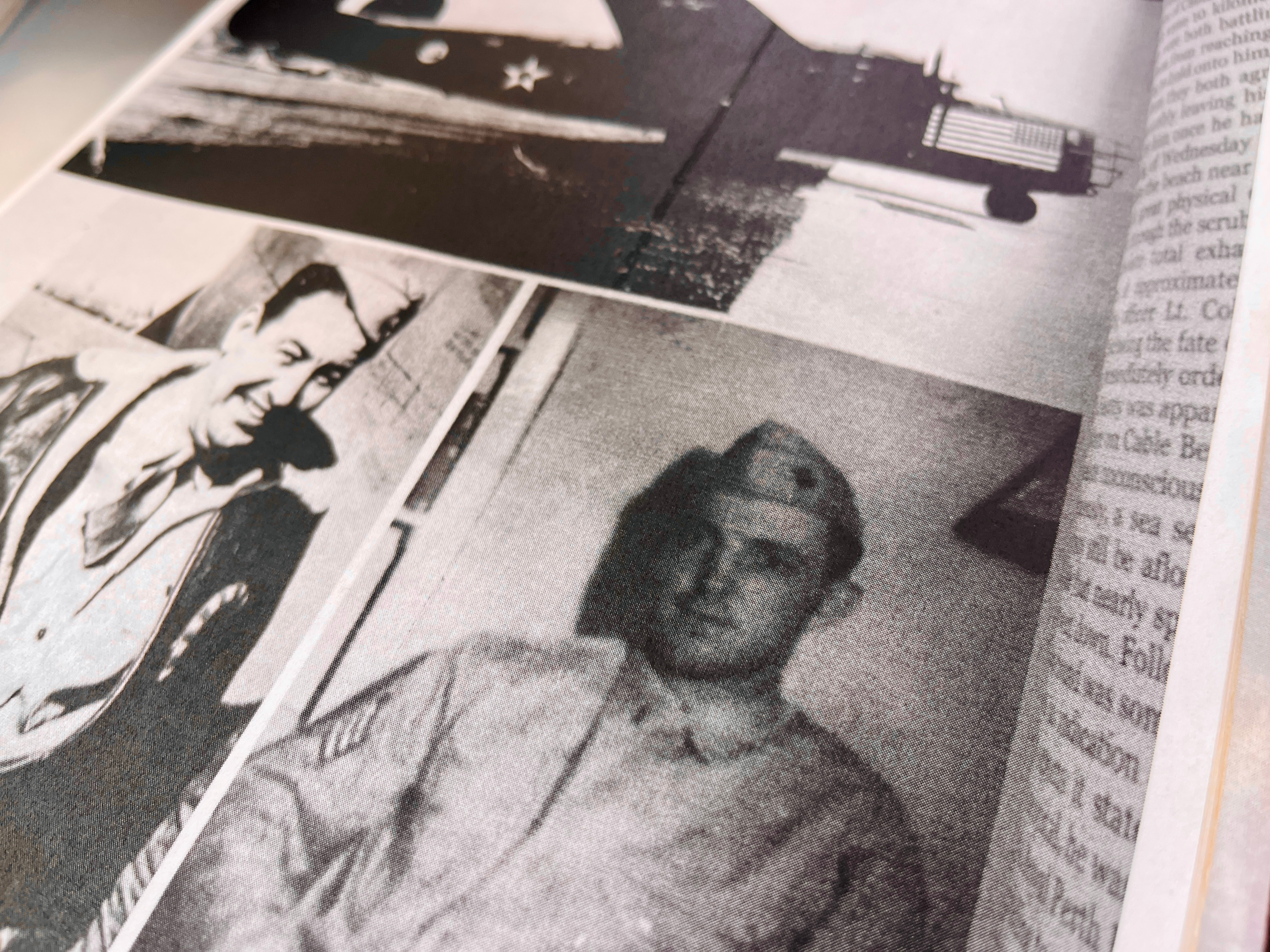 A blurry black and white image of a young man is army uniform.