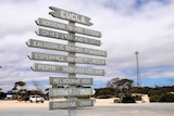 Eucla sign showing distance to other towns and cities.
