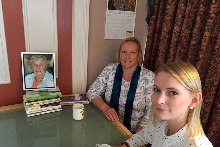 Helen (r) and Trish Kershaw with of photo of their grandmother and mother, Sheila.
