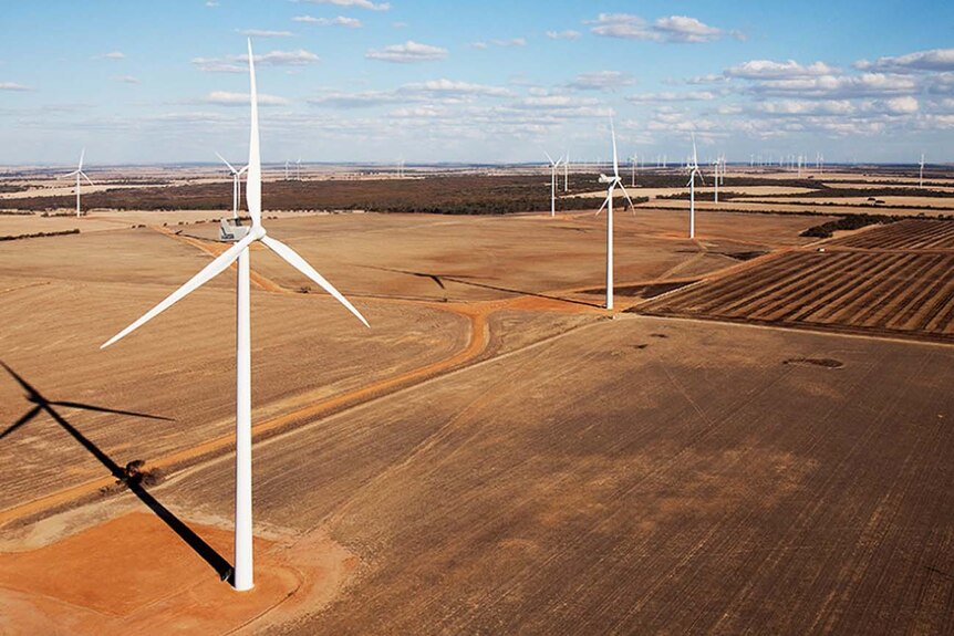Aerial picture of wind farm in brown paddock