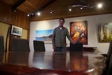 A man standing at a table