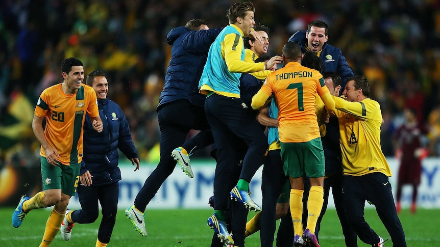 Socceroos celebrate Kennedy's winner