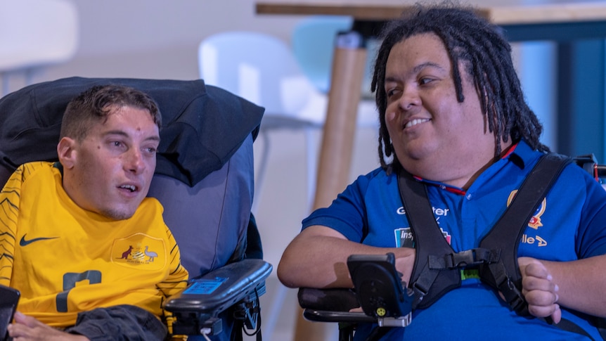 Poweroos teammates Abdullah Karim (left) and Dimitri Liolio-Davis at the Powerchair Football World Cup launch in Sydney on Thursday. 