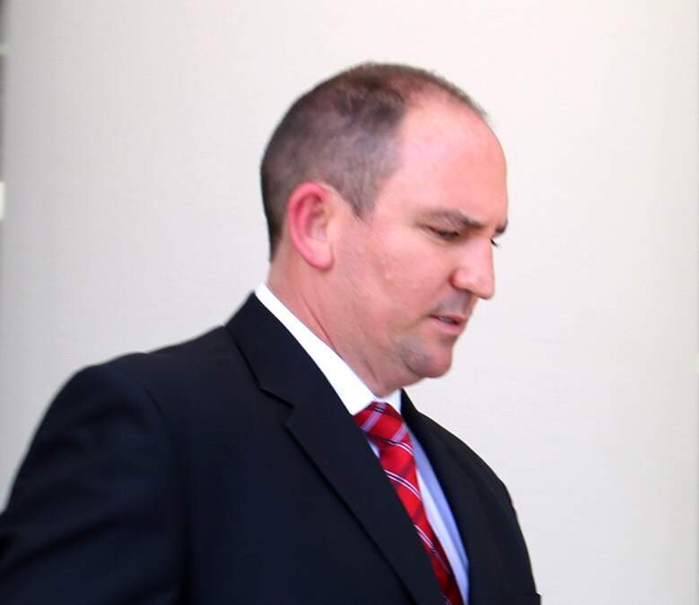 Police officer accused of slapping handcuffed teenager denies ...
