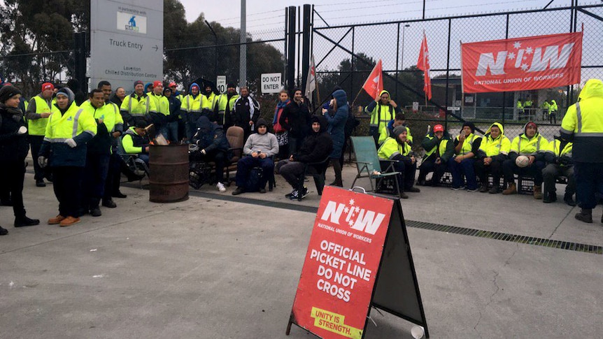 Workers at a Coles distribution centre on strike at Truganina, Victoria