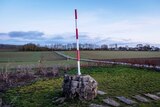 A red and white pole marks the new geographical centre of the European Union.