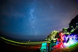 Crowd gathers at Kiama to view the annual Geminids meteor shower.