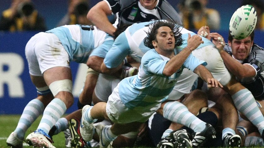 Augustin Pichot clears the ball for Argentina