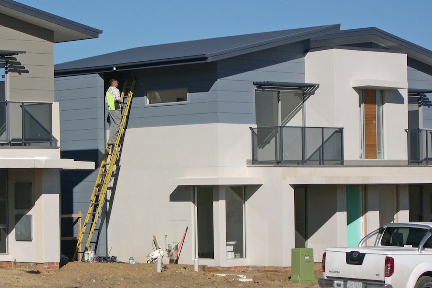 Builder working on a town house being built at McCubbin Rise in North Weston Canberra May 2012 Good generic