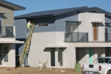Builder working on a town house being built at McCubbin Rise in North Weston Canberra May 2012 Good generic