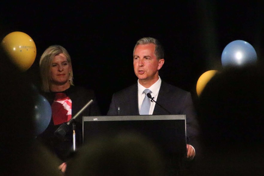 Jeremy Hanson speaks at a podium