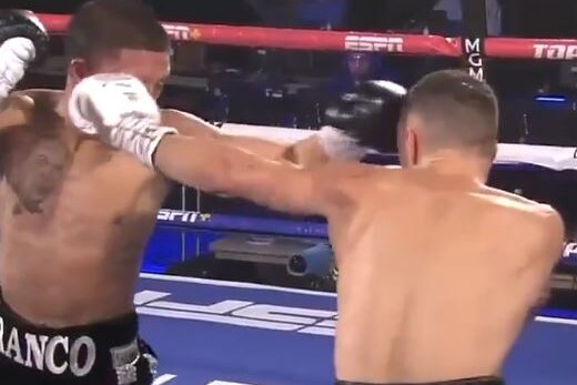 A screenshot of Andrew Moloney striking Joshua Franco in the right eye with a left jab
