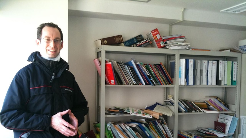 Dominic Jones inside his office the day after Japan's fierce quake