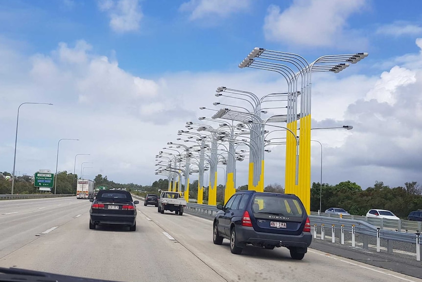 A light installation on the M1 at Yatala saying 'Gold Coast', installed before the 2018 Commonwealth Games.