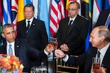 US President Barack Obama and Russian President Vladimir Putin share a toast at a luncheon at the UN.
