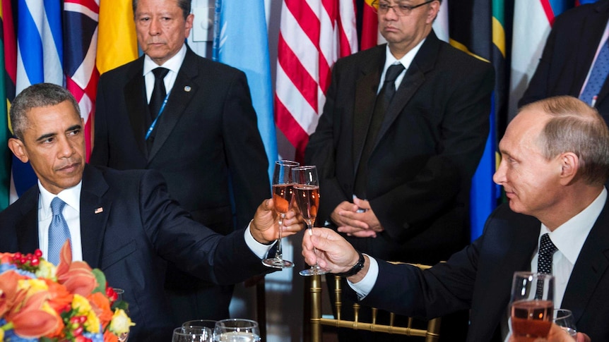 US President Barack Obama and Russian President Vladimir Putin share a toast at a luncheon at the UN.
