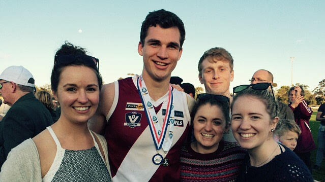 Ben Amberg with female fellow medical students after winning the Grand Final in the Gippsland footy league.