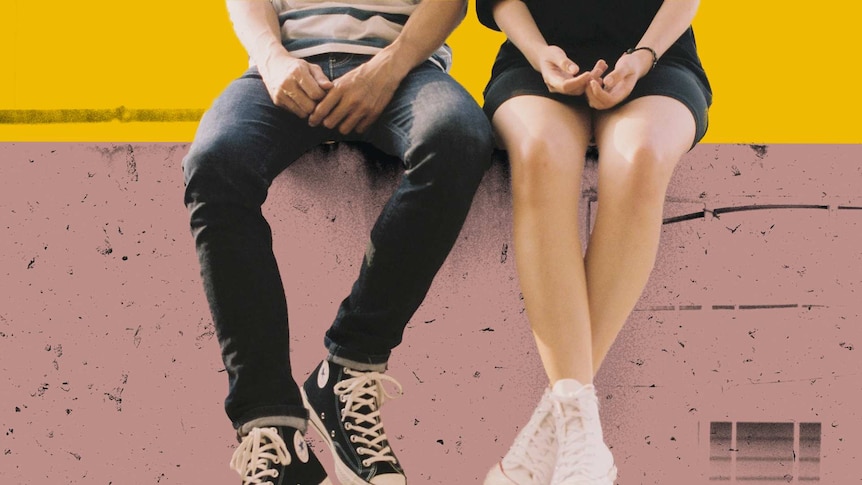 Legs of man and woman in conversation, in a story about how to tell a new partner about your past sexual trauma.