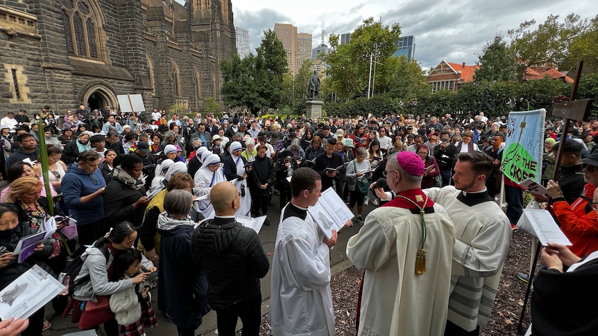Worshippers gather in Melbourne to observe Good Friday. 
