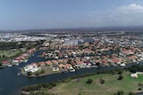 Aerial view of houses built around canals