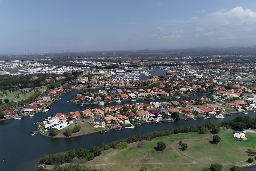 Aerial view of houses built around canals