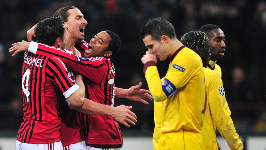 Piling on the misery: Zlatan Ibrahimovic celebrates his penalty to cap off the Arsenal rout.