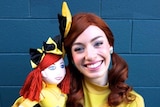 Yellow Wiggle Emma with an Emma doll